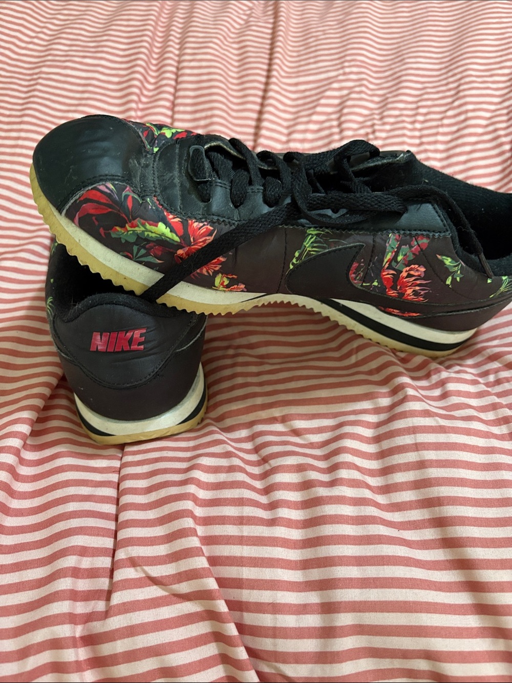 Nike Women’s Black Sneakers with Red Floral Accent